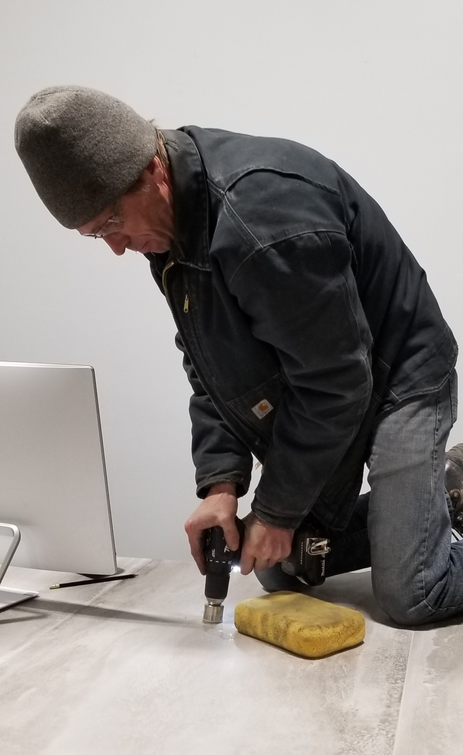 Matt drilling hole in counter